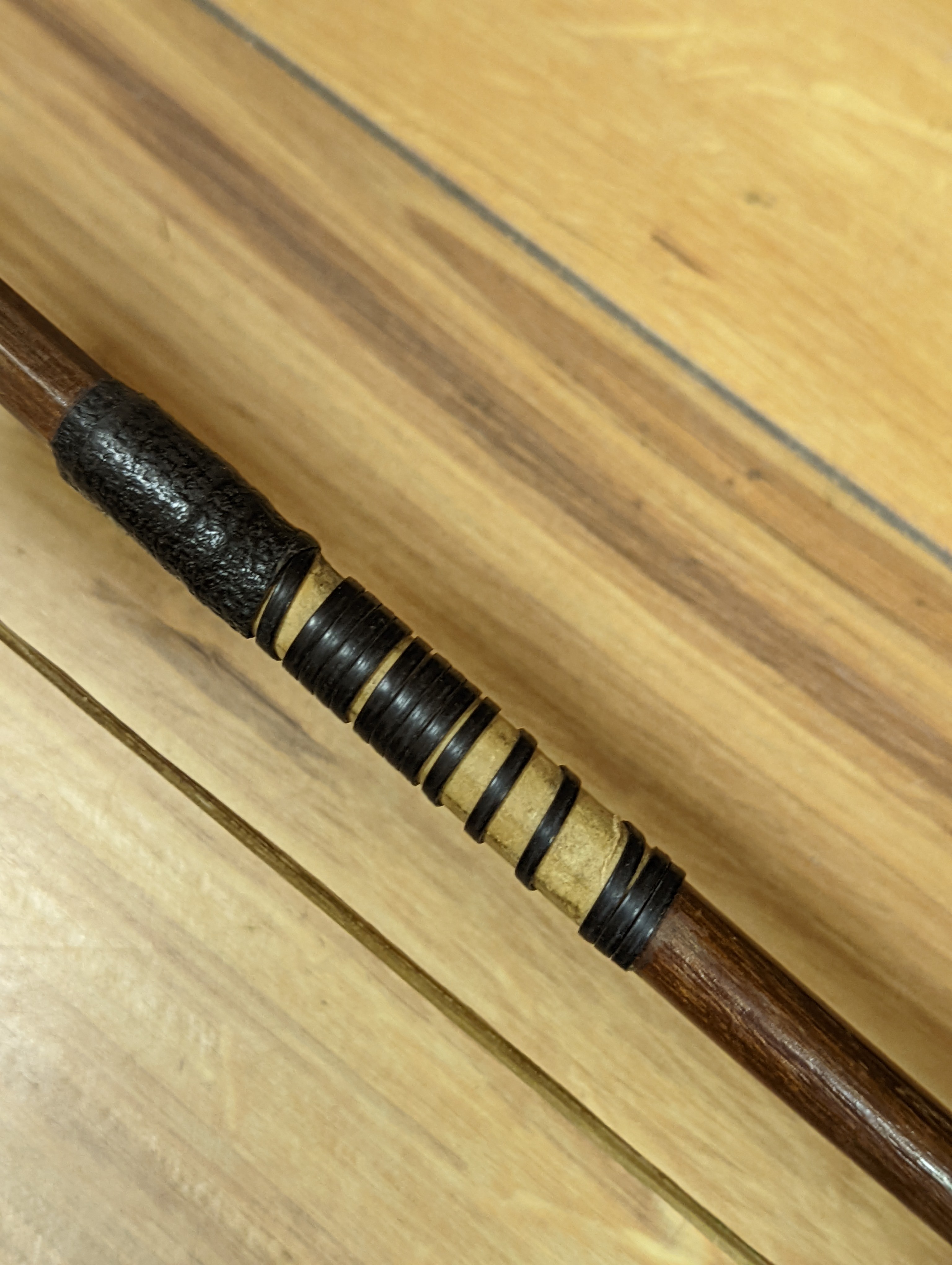 An early 20th century French vioilin, cased with bow and a cased saxon violin